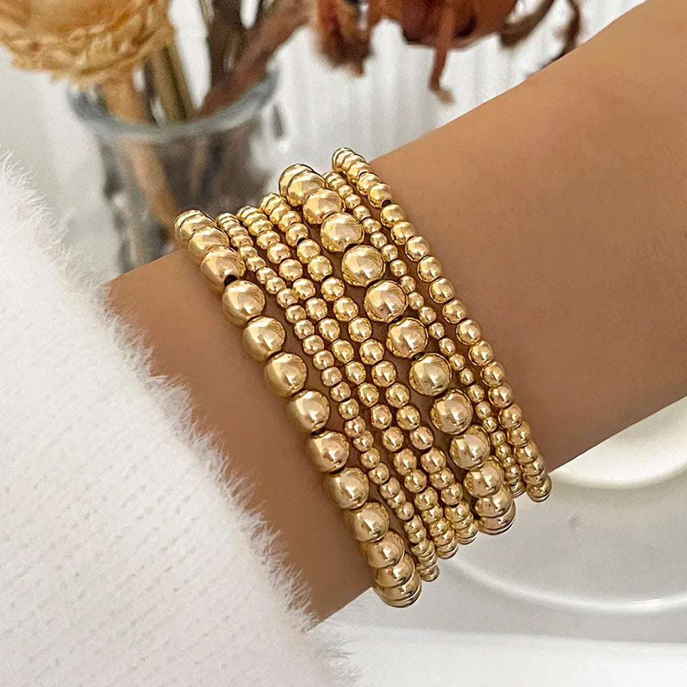 Bold Sphere Stack Bracelet – Gold Beaded Elegance
