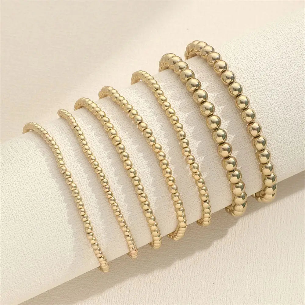 Bold Sphere Stack Bracelet – Gold Beaded Elegance